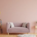 Living room interior wall with pink sofa on pink wall